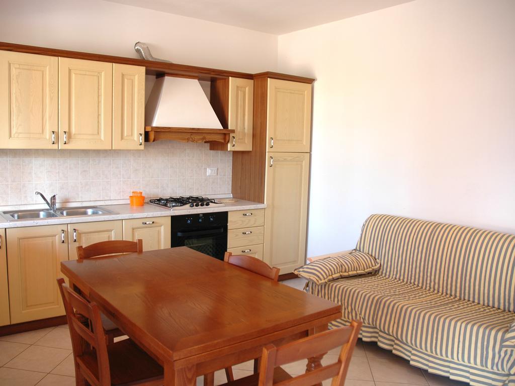 Baia Fiorita Appartement Porto Azzurro Buitenkant foto